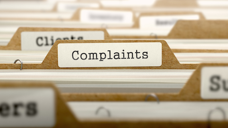 Complaints Concept with Word on Folder.  labm