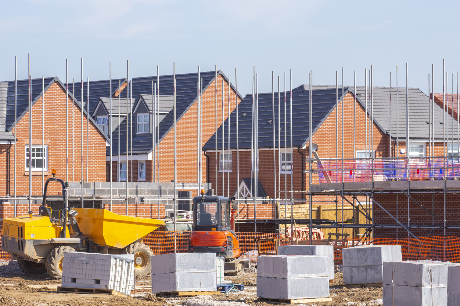 New build houses building construction site, Cheshire, England, labm