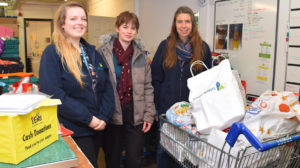 Chloe and Natalie from Hightown and Michelle from DENs foodbank