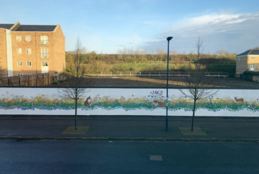 Masterpiece created by local residents on the hoarding at Orchard Park, Cambridge
