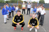 Local school children challenge Cambridge United players to keepy uppies