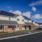 First residents move into affordable eco-friendly homes in Anglesey village