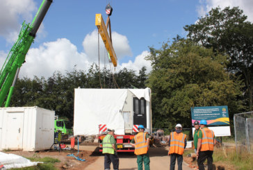 Modular homes craned on to former garage site as part of Citizen’s extended modular pilot