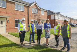 Stakeholders enjoy a visit to new Deeside affordable homes