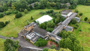 Freeley commences demolition of derelict high school