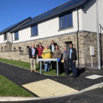 Building contractor hands over 18 new homes for affordable rent in Powys market town
