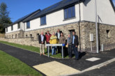 Building contractor hands over 18 new homes for affordable rent in Powys market town