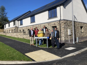 Building contractor hands over 18 new homes for affordable rent in Powys market town
